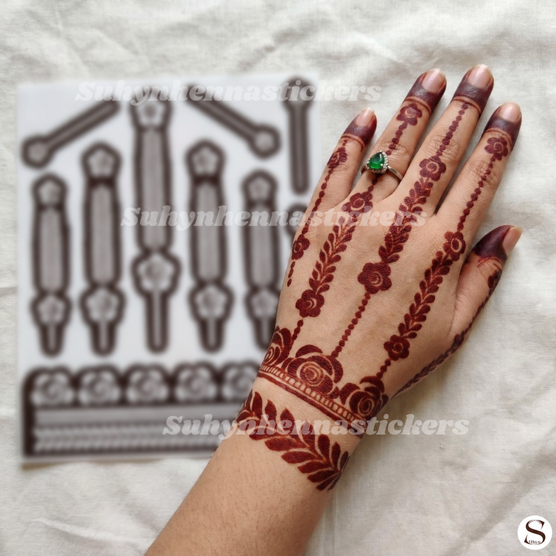 Rose chain wrist Mehendi Sticker with floral linework, leafy trails, delicate finger strings and decorative wrist band pattern by Suhyn