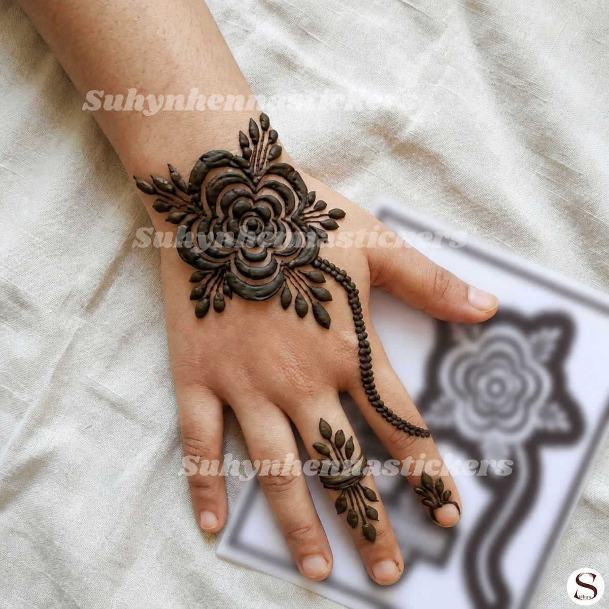 Bloom chain Hand Mehendi Stencil with bold floral centre, leafy detailing and finger-linked chain pattern by Suhyn
