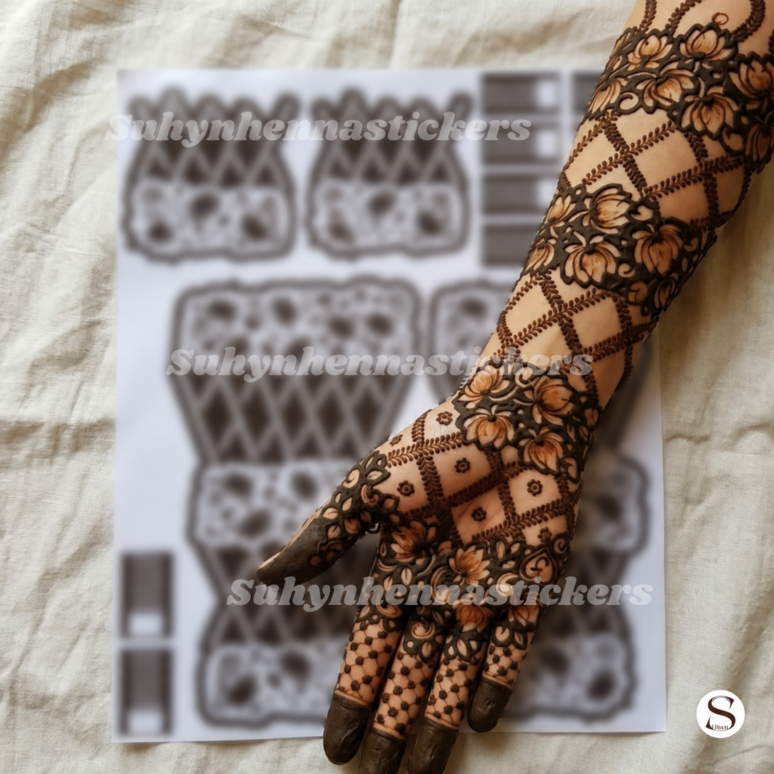 Bloom Lattice Luxe Mehendi Stencil featuring layered flowers, diagonal lattice sections and richly detailed finger patterns by Suhyn