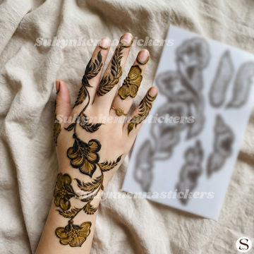 Botanical bloom trail Mehendi Stencil with flowing floral arrangement, leafy curves and elegant full-hand composition by Suhyn
