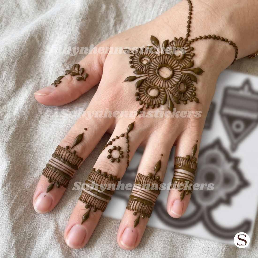 Floral jewellery back hand mehendi sticker with flower centre, finger chains and bracelet design by SUHYN