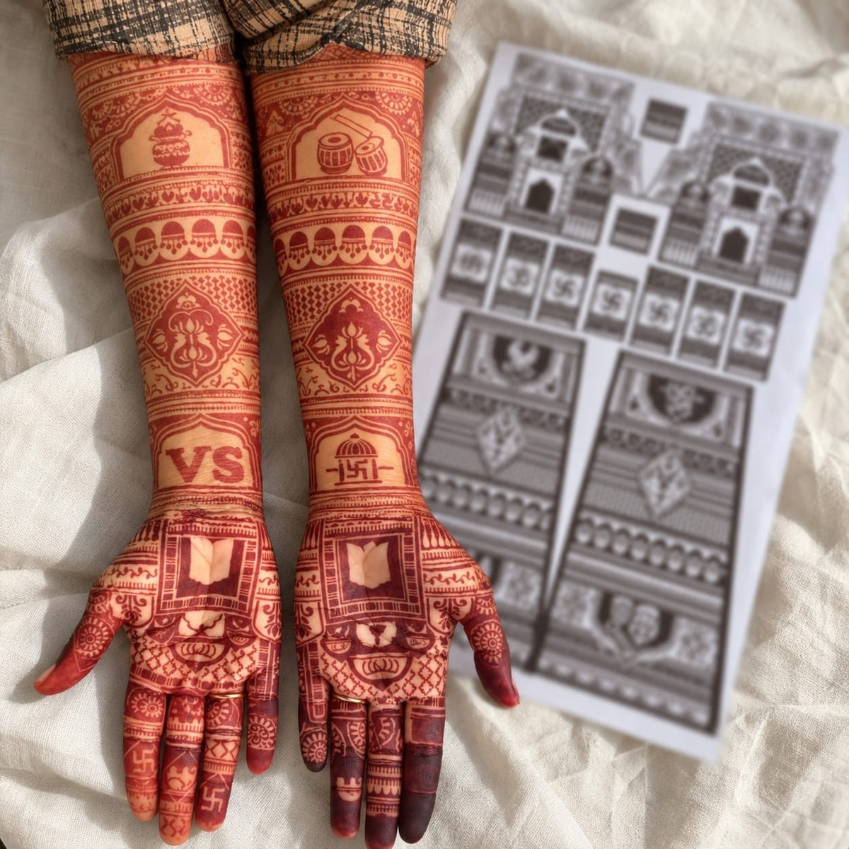 Suhyn Heritage Garland bridal mehendi stencil with flower borders, diamond patterns, net detailing and ornamental palm sections