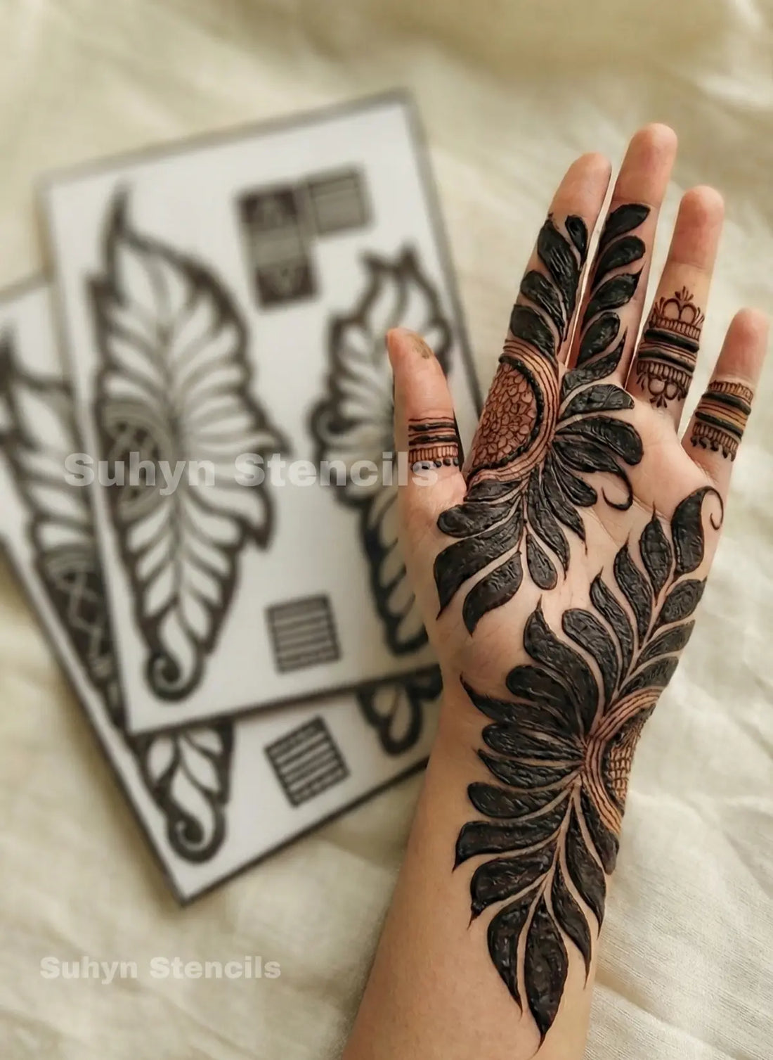 Leaf floral mehendi sticker with flowing palm and wrist design
