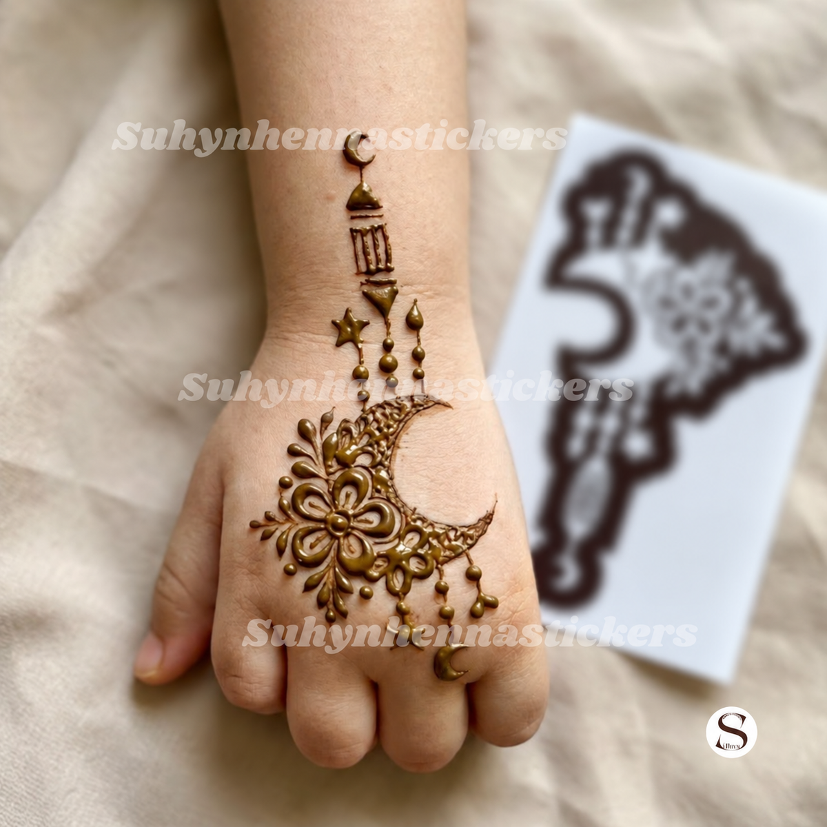 Moonlight Blossom Charm Mehendi Stencil featuring a floral crescent, hanging star details and delicate ornamental accents by Suhyn
