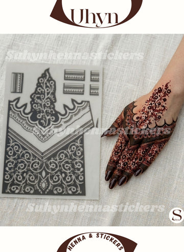 Single back-hand mehendi sticker with dark floral lace pattern, scalloped borders, and fine finger detailing by Suhyn
