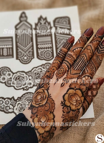 Rose backhand henna sticker with large layered flowers, geometric striped fingers, leafy accents and circular ornamental fillers by Suhyn
