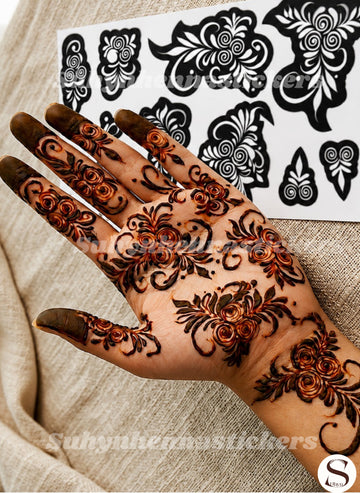Minimal floral palm mehendi stencil with rose clusters, airy spacing, and elegant finger accents by Suhyn

