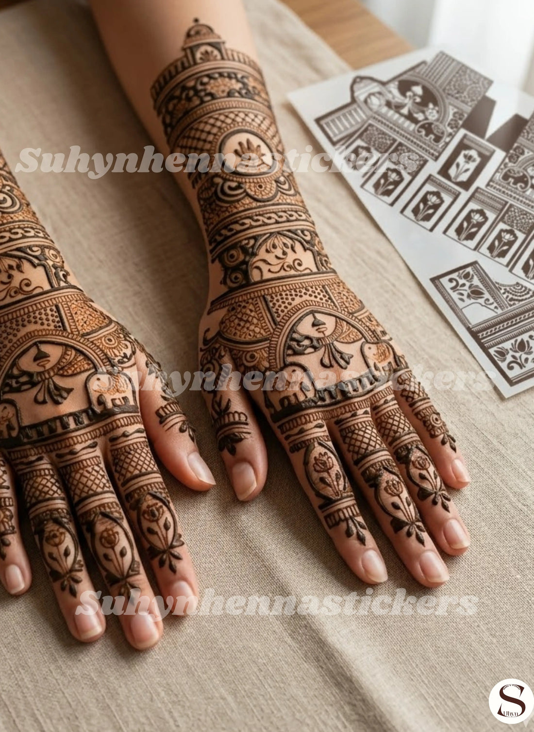 ALT TEXT
Traditional elephant mehendi sticker with floral hand and wrist patterns
